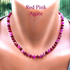 This exquisite Agate Necklace showcases vibrant 6mm red agate beads, carefully knotted with dark red thread to create a striking piece of jewelry. The rich hues of the agate beads add a touch of elegance and warmth, making it a perfect accessory for any outfit. The necklace measures 18 inches in length and includes a 2-inch extender, adjustable up to 20 inches, ensuring a comfortable fit that gracefully follows the contours of your neck. Ideal for layering, this necklace is versatile and can be Knotted Necklace, Red Thread, Gemstone Beaded Necklace, Necklace Red, Pink Agate, Red Gemstones, Agate Jewelry, Red Agate, Agate Necklace