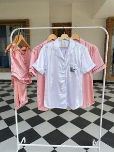 Baby Pink PJ Set, Pink shirt and short set, pink Satin Set, Silky Satin Pajamas, Matching Pajamas, Holiday Pajamas, Bridesmaid Pajamas, Friends Pajamas Set, Bridal Party Set, Bridesmaid Proposal Box, Brides Gift for Bridesmaid, Soft Silk Pajamas, Satin Luxury Pajamas. Pajamas are evergreen and this satin series is just the thing you can't keep your hands off. 🌸 Silk Satin Collection -2022🌸 These Pjs are the best gifts for your bride, bridesmaids, in laws to be, bachelorette parties and beach p Summer Wedding Night Short Sleeve Sleepwear, Pink Short Sleeve Short Set For Sleep, Pink Short Sleeve Sleep Set, White Short Sleeve Sets For Wedding Night, White Short Sleeve Sets For Home, White Short Sleeve Home Sets, Pink Short Sleeve Bedtime Set, Pink Short Sleeve Short Set For Bedtime, Pink Short Sleeve Home Sets