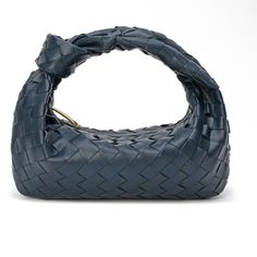 Nwot Leather Woven Handbag Office Bags With Braided Top Handles, Office Bags With Top Handle And Braided Handles, Luxury Blue Baguette Bag, Luxury Blue Rectangular Baguette Bag, Office Bag With Braided Top Handle, Leather Clutch With Braided Handles For Daily Use, Designer Blue Leather Clutch, Gold-tone Hardware Baguette Bag For Shopping, Elegant Blue Baguette Bag For Evening