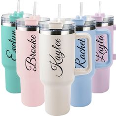 four different colored tumblers with straws in them and the words believe, believe, believe