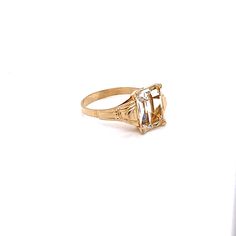 Vintage 1940's 10k yellow gold rectangular stone ring. The ring would be a great travel ring. The size of the ring is a 7, and has the ability to be resized. The height of the ring off of the finger is 4.3mm. The width of the band is 2mm. Center stone measures 10mm x 7.7mm Rectangular Topaz Ring In Yellow Gold, Heirloom Square Cut Rings With Prong Setting, Heirloom Square Cut Ring With Prong Setting, Vintage Diamond Cut Baguette Rings, Formal Rectangular Rings With Center Stone, Classic Rectangular Gemstone Birthstone Ring, Vintage Baguette Cut Diamond Rings, Vintage Baguette-cut Diamond Rings, Classic Rectangular Birthstone Ring