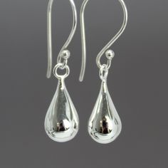 Beautiful sterling silver teardrop earrings. So elegant and dainty perfect for everyday wear.About 1.25" L and 1/4" WSolid 925 Sterling SilverLight weight and comfortableArtisan made in TexasArrives thoughtfully packaged in a signature kraft jewelry box