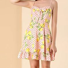 100% Polyester Zipper Closure Bowknot, Concealed Zipper Back, V Neck, Lemon Or Floral Print, Dots, Fully Lined, Ruffle Hem Mini Dress Occasion: Dating, Party, Weekend, Social Activities, Beach, Travel, Valentine's Day, Holiday, Etc Pair With Sandals Or Heels To Set The Mood For Sunny-Day Strolling In This Flowing Lemon Dress Styled With An Asymmetrical Hem, Lemon Polka Dots Pattern. Cute Summer Mini Dress With Adjustable Straps, Cute Vacation Mini Dress With Tie Straps, Cute Mini Dress With Tie Straps For Vacation, Cute Mini Sundress With Tie Straps, Cute Mini Dress With Adjustable Straps For Brunch, Cute Mini Dress With Tie Straps For Brunch, Cute Sundress With Tie Straps, Cute Vacation Dresses With Adjustable Straps, Cute Dresses With Adjustable Straps For Vacation