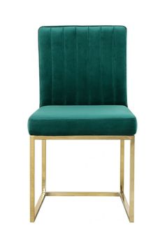 a green velvet chair with gold legs