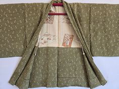 https://antiqueshopjunna.etsy.com Japanese Silk Kimono ,Haori Jacket, 100% Silk Condition is very good. Size: Body length 75cm Width 58cm Sleeve length 60cm Shipping: Items are shipped via International e-packet light. (Include Tracking) Delivery will take an AVERAGE of 2~3weeks. Caution: Import duties, taxes, and charges are not included in the item price or shipping cost. These changes are the buyer's responsibility. Please check with your country's customs office to determine what these addit Samurai Style Kimono For Tea Ceremony, Ceremonial Vintage Kimono, Green Kimono With Kimono Sleeves For Tea Ceremony, Silk Kimono Jacket, Haori Jacket, Kids Jackets, Kimono Coat, Japanese Silk, Silk Kimono