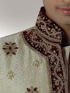 Designer Cream Brocade Sherwani - Sherwani - Men's Eid Velvet Fitted Bandhgala, Velvet Bandhgala For Eid Festivities, Fitted Velvet Bandhgala For Eid, Traditional Semi-stitched Embellished Kurta, Traditional Embellished Semi-stitched Kurta, Traditional Embellished Transitional Kurta, Festive Semi-stitched Embellished Sherwani, Festive Embellished Semi-stitched Sherwani, Festive Embellished Traditional Wear With Multicolor Embroidery