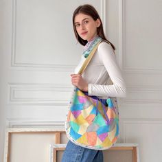 This bag is ideal for those who love bold, artistic accessories that stand out and bring a splash of colour to their outfit. Whether for casual outings, shopping trips, or as a unique gift, this patchwork shoulder bag combines functionality with creative design.  Lining - Yes Pocket - Yes Thickness -Medium Cover: Cotton 100% Digitally Printed Lining : Cotton 100%   Cold Wash (Machine washable) Summer Multicolor Large Capacity Satchel, Multicolor Large Capacity Satchel For Summer, Multicolor Satchel For Summer Travel, Retro Shoulder Bucket Bag For Travel, Retro Style Bucket Bag For Travel, Retro Bucket Bag For Travel, Retro Travel Bucket Bag As Shoulder Bag, Retro Travel Bucket Shoulder Bag, Trendy Multicolor Bucket Bag For Daily Use