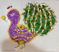 an artistically designed bird made out of flowers