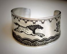 "Horse bracelet, Appaloosa horse, known for its stunning markings was developed by the Nez Perce Indians. Today they are treasured for their color and wonderful temperament. I had fun designing this delightful \"Spirit\" cuff . Pure pewter, fits wrist 5 3/4\" to 8 inches around. More of my horse jewelry visit www.horseladygifts.com" Horse Bracelet, Appaloosa Horse, My Horse, Appaloosa Horses, Horse Jewelry, Appaloosa, Wide Cuff, Head And Neck, Women's Style