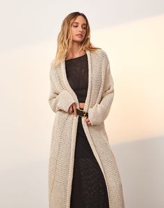 The ViX Knit Midi Long Cardigan is a timeless and lightweight piece that will keep you warm when the breeze carries a subtle chill. It features an open front for easy wear all day long.  Style the Knit Midi Long Cardigan with your favorite set and accessorize with jewelry and sandals for a cozy, put-together ensemble.Features: Knit long cardigan;  Open front;  Long sleeves; Style# 295-859-003 Long Knit Vest, Knit Long Cardigan, Sleeves Style, Cardigan Vest, Knit Midi, Long Style, Open Knit, Knit Vest, Long Cardigan