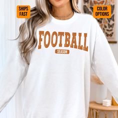 This is a unisex, garment-dyed Football Mama crewneck sweatshirt that is perfect for everyday wear. It's cozy and the feel is soft to the touch and great for casual, oversized or relaxed style.  Perfect for any pet lover! A soon to be favorite for anyone's wardrobe. Design color & size oWe do our best to match the color on the design mockup/image to our printed product.  This is not a 100% guaranteed exact match. oPlease check the size chart to make sure you are ordering the correct size as we do not offer returns due to the customization process. Please reach out with any questions. Fabric (materials) oThis is a medium-heavy fabric that is 80% cotton and 20% polyester. The fabric is 3-end garment-dyed, ring-spun, color-blast fleece with a 100% cotton face. Casual, relaxed or oversized fit Crew Neck T-shirt For Game Day In Fall, Long Sleeve T-shirt With Lettering For Game Day, Long Sleeve Cotton T-shirt For Football Season, Game Day Crew T-shirt For Fall, Crew T-shirt For Game Day In Fall, Football Season Cotton Crew Neck Sweatshirt, White Cotton Football Season Sweatshirt, Fall Fan Apparel Sweatshirt With Text Print, Relaxed Fit Screen Print Sweatshirt For Sports Season