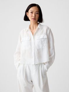 Soft, breathable linen cropped shirt.  Point collar.  Long sleeves with button cuffs.  Button front.  * Fit: Slightly fitted.  Sits close to the body.  Cropped, hits at the waist.  Note: Tyla is wearing a Gap Pants For Short Women, White Long Sleeve Tshirt, Long Sleeve Layering, Linen Crop Top, Linen Bottoms, Linen Crops, Layered Shirts, Cropped Shirt, Shirt And Pants