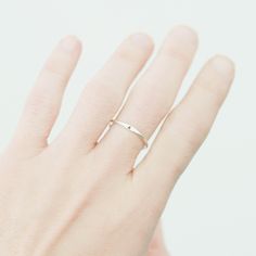 The Wave Initial Ring Our slim 1.3 mm band is hand formed, soldered, hammered and stamped with your tiny initial or monogram (up to 3 characters). Wear one, or stack them for all your loves. ♥ This listing is for one ring; add multiple quantities to your cart for more. {DETAILS}: * 1.3 mm band (2 mm where initial sits) * 1.5 mm initial * your choice of sterling silver, 14k gold fill, rose gold fill or solid 14k gold! ►Lots more stacking rings for...stacking! http://etsy.me/1U0RlXp ►Silver heart Personalized Initial Ring, Sterling Silver Stacking Rings, Letter Ring, Stacking Bands, Personalized Ring, Initial Ring, Minimalist Ring, Personalized Rings, Personalized Initials