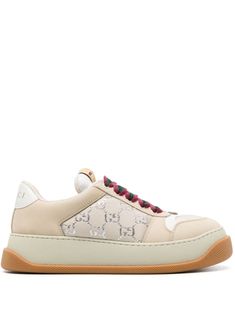 light beige multicolour calf leather panelled design GG lamé canvas signature Double G logo enamel detail logo plaque logo patch at the tongue branded heel counter wide laces round toe front lace-up fastening padded tongue padded ankle French terry lining branded insole chunky rubber sole This piece comes complete with a protective dust bag. Women's Gucci sneakers fit large. For the most comfortable fit please select half a size down. We've partnered with Good On You — an independent agency that Tenis Gucci, Gucci Screener, Double G Logo, Retro Sportswear, Gucci Shoes Sneakers, Guccio Gucci, Gucci Sneakers, G Logo, Green Sneakers