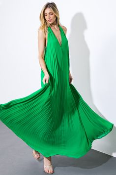 An exquisite woven maxi dress with a V halter neckline, delicate pleating, and a bare back secured by a neck tie.Details:Self : 100% PolyesterLining : 100% PolyesterSize & Fit- Model is 5`8" And Wearing Size Small- Measurements Taken From Size Small- Approx. Length: 62" Green Halter Neck Dress For Date Night, Green Halter Neck Dress For Evening, Green Backless Maxi Dress For Evening, Green Backless Halter Dress For Evening, Pleated Floor-length Maxi Dress For Date Night, Maxi Length Pleated Dress For Date Night, Green Backless Maxi Dress For Date Night, Green Halter Neck Maxi Dress For Date Night, Backless Green Maxi Dress For Date Night