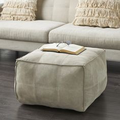 a couch and ottoman in a living room