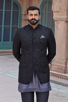 Black bundi with floral embroidered motifs and front button placket. Paired with kurta and pant.
Components: 3
Fabric: Raw Silk
Neckline: Mandarin
Sleeve Length: Full
Color: Black
Embroidered
Flap pockets
Patch pockets
Note: Pocket square worn by the model is not for sale - Aza Fashions Traditional Nehru Jacket With Chikankari Embroidery For Semi-formal, Semi-formal Traditional Nehru Jacket With Chikankari Embroidery, Traditional Semi-formal Nehru Jacket With Chikankari Embroidery, Embroidered Nehru Jacket For Eid Semi-formal, Embroidered Nehru Jacket For Eid And Semi-formal Occasions, Embroidered Nehru Jacket For Semi-formal Eid Occasions, Traditional Embroidered Semi-formal Sets, Festive Semi-formal Embroidered Outerwear, Embroidered Nehru Jacket For Diwali Semi-formal Occasions