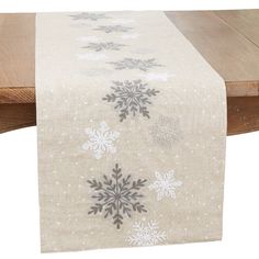 Embrace the enchantment of winter with this Snowflakes Table Runner. Delicately adorned with intricate snowflake designs, it adds a touch of seasonal charm to your table. Crafted with care, this runner sets the stage for cozy gatherings and creates a festive and inviting atmosphere. Welcome the beauty of the season with this exquisite snowflakes table runner. Winter Table Runners, Winter Table Runner, Snowflake Table, Intricate Snowflake, Heritage Lace, Modern Holiday Decor, Winter Table, Burlap Table Runners, Needle Point