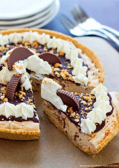 there is a pie with chocolate and cream toppings on the top, ready to be eaten