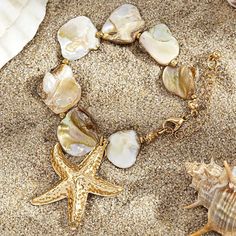 Boho Exquisite Gold Starfish Charm Bracelet - Summer Beach Fashion Jewelry for Women Elevate your summer style with the Boho Exquisite Gold Starfish Charm Bracelet. This elegant piece features a charming gold starfish pendant, embodying the essence of beach fashion and boho chic. Crafted with attention to detail, this bracelet combines classic elegance with a playful summer vibe. Its gold color adds a touch of sophistication, while the starfish charm evokes a sense of coastal adventure. Perfect Beach Jewelry With Adjustable Star Charm, Beach Adjustable Jewelry With Star Charm, Adjustable Beach Jewelry With Star Charm, Adjustable Star Charm Jewelry For Beach, Gold Charm Bracelet With Lobster Clasp For Beach, Adjustable Gold Charm Bracelet For The Beach, Bohemian Style Bracelet With Starfish Charm, Vacation Bracelet With Starfish Charm, Adjustable Gold Charm Bracelet Ocean-inspired