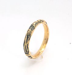 This is the most narrow of my Memento Mori rings at 3mm wide and is cast in 14k rich yellow gold. The Skeleton is flanked by intertwined hearts on one side.14k rich yellow gold and EnamelMade to Order. Usually ships in 3-5 days.This ring looks great as part of a stack, as a wedding band, a right-hand ring, or a promise ring, and all by its damn self, thank you very much. And as always, my rings are Unisex. Y’all wear what you want!I made these Memento Mori rings for my older sister Jill, a famou Yellow Gold Brass Engraved Ring For Promise, Unique Yellow Gold Engraved Ring, Unique Engraved Yellow Gold Ring, Hand Forged Yellow Gold Promise Jewelry, Hand Forged Yellow Gold Jewelry For Promise, Hand Forged Gold Engraved Promise Ring, 14k Gold Hand Forged Promise Ring, Unique Gold Stackable Rings For Promise, Unique Gold Stackable Promise Rings