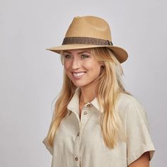 Boxcar Womens Straw Sun Hat with neutral sand tones, is a stylish fossil imprinted leather hatband, and 100% quality construction make the Boxcar - Womens Straw Hat an all-time favorite. It sports a classic teardrop fedora crown, 2½” sun-protective brim, and lightweight straw construction. Classic Beige Hat Band For Travel, Elegant Brown Hat Band For Everyday, Brown Brimmed Hat Bands For Everyday, Classic Brown Sun Hat For Travel, Brown Flat Bill Fedora For Travel, Brown Flat Bill Fedora For Vacation, Brown Flat Bill Travel Hat, Curved Brim Safari Fedora For Travel, Safari Style Fedora With Curved Brim For Travel