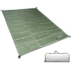 a green tarp with a sleeping bag next to it and an image of the tarp