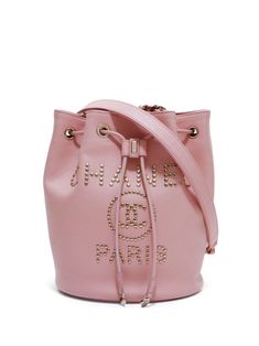 circa 2017-2018 light pink calf leather bucket body stud embellishment signature interlocking CC logo leather and chain-link shoulder strap detachable shoulder strap drawstring fastening main compartment internal zip-fastening pocket internal logo patch full lining gold-tone hardware Serial number: 29371962 This item comes with an original authenticity seal. Condition: GOOD. This previously owned and used item is in good condition with minimal signs of use. This may include fading of material or plating and scratches. Purchasing this item continues its narrative and reduces the environmental impact by avoiding the use of new resources needed to make the product from scratch, such as water, materials and electricity, and avoiding additional manufacturing impact. Learn more about what makes Trendy Pink Bags With Logo Hardware, Trendy Pink Shoulder Bag With Logo Hardware, Pink Leather Bag With Logo Hardware, Pink Shoulder Bag With Metal Logo For Everyday, Designer Bucket Shoulder Bag With Logo, Designer Logo Bucket Shoulder Bag, Pink Shoulder Bag With Logo Hardware For Travel, Bucket Shoulder Bag With Logo, Pink Travel Shoulder Bag With Logo Hardware