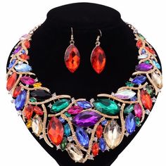 Boho Trendy Statement Necklace Set. It is made of Handmade Crystal and will shine in lights, Comfortable to wear. Easy to match most Cloth. And is an excellent Choker to wear when you go Party, Weddings, for bridesmaid jewelry, Travel, and also for Daily Use. It can be a gift to a mother, sisters or friends, we will sure they will like them very much. Boho Trendy Statement Necklace Set Shape\pattern: Water Drop Metals Type: Zinc alloy Material: CRYSTAL Processing Time: Once your order is receive Adjustable Clavicle Chain Jewelry For Evening, Party Bling Jewelry Choker, Party Bling Choker Jewelry, Bling Party Choker Jewelry, Costume Jewelry For Party In Metal, Costume Party Jewelry In Metal, Party Costume Jewelry In Metal, Costume Jewelry For Parties, Crystal Jeweled Necklaces For Celebration