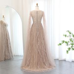 a dress on display in front of a mirror