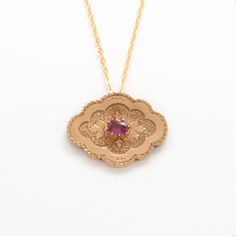 A 14k gold antique Victorian (circa mid/late 1800s to early 1900s) brooch has been converted into a charm pendant and strung on a simple gold filled chain. Central purple stone is an amethyst. Gorgeous piece! Conversion pendant measures 1” in width x 3/4” in height. New 14k gold-filled chain. Chain length is 16". If desired, an adjustable chain length may be built into the existing chain to be more versatile, adjustable from 16-17-18 inches. Wear this pendant necklace shorter or longer depending Victorian Necklace With 17 Jewels In Oval Pendant, Victorian Yellow Gold Jewelry With Large Pendant, Rose Gold 14k Necklace With Large Pendant, Victorian Rose Gold Filigree Necklace, Victorian Rose Gold Medallion Necklace, Heirloom Rose Gold Medallion Necklace, Vintage Yellow Gold Gemstone Necklace, Vintage Amethyst Yellow Gold Necklace, Heirloom Filigree Pendant Necklace