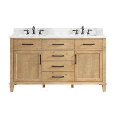 the double sink vanity is made from wood and has two faucets on each side