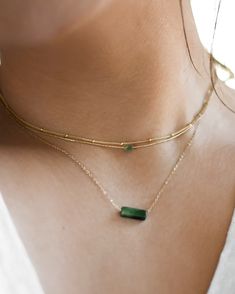 𝗘𝗮𝘀𝘆 𝗧𝗼 𝗦𝘁𝘆𝗹𝗲, 𝗠𝗮𝗱𝗲 𝗧𝗼 𝗟𝗮𝘀𝘁 Our dainty jade gemstone necklaces are easy to layer and ready to be worn on repeat. Created to last a lifetime, these necklaces will remain evergreen even as the years and trends come and go! - Small rectangle stone measures 4mm - Small round stone measures 5mm - Large rectangle stone measures 13mm - Large rectangle stone measures 13mm  Looking for a specific shade of stone? You may request this in the "note to seller" box at checkout! We will do Jade Clavicle Chain Necklace, Minimalist Jade Gemstone Jewelry, Dainty Jade Gemstone Jewelry, Delicate Green Jewelry With Natural Stones, Minimalist Birthstone Jewelry For Layering, Dainty May Birthstone Delicate Chain Jewelry, Gemstone Double Strand Necklace, Green Minimalist Chain Necklace With Adjustable Chain, Double Strand Gemstone Necklace For Layering