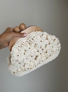 Crochet Raffia Bag, Beige Luxury Handbags, Mothers Day Gifts, Vintage Clutch Bag, Handmade with Motifs Clutch Bag for Women,Gift for Her  ❤️You will love this handmade crochet bag ❤️ ⭐️ A complete complement that you can use anytime, anywhere, day or night. ⭐️ Easy to use with wooden handle ⭐️ Lined inside, does not stretch The inside of the bag is wide, You can easily carry your personal belongings. Specification and materials of this piece: Rafia Yarn, Board Scholarship, lined inside Width: 32 Cream Bag With Detachable Handle As Gift, Handmade Cream Handheld Bag, Handmade Cream Handheld Bags, Handheld Handmade Cream Bag, Handheld Cream Handmade Bag, Everyday Handmade White Pouch, Handmade White Clutch For Daily Use, Eco-friendly Handmade Clutch Bag, Cream Crochet Pouch Bag For Daily Use