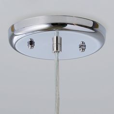 an overhead view of a bathroom faucet with water running from it's spout