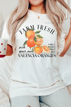 Dive into summer with farm-fresh valencia oranges, indulge in the softness of a Comfort Colors t-shirt. Whether paired with shorts for a beach day or dressed up with a skirt for a sunset soirée, this summer staple exudes both comfort and farmcore flair. 𝔻𝔼𝕋𝔸𝕀𝕃𝕊 Comfort Colors 1717 T-Shirt 💗Fabric content: 100% Cotton 💗Feel: luxe thick garment-dyed cotton 💗Fit: oversized unisex fit - Models are wearing XL Gildan 5000 T-Shirt 💗Fabric content: 100% Cotton; heathered colors have added polyester 💗Feel: tubular jersey knit cotton 💗Fit: standard unisex fit - Models are wearing L ➡️Direct to Garment Printing uses ink jet technology to spray ink onto garments for a strong bond between the ink and fibers. ➡️Kindly note that colors, contrast, textures and positions of graphics can slight Peach Short Sleeve T-shirt For Summer, Organic Short Sleeve T-shirt For Spring, Peach Short Sleeve Top For Brunch, Peach Short Sleeve Shirt For Summer, Orange Letter Print T-shirt For Spring, Summer Peach T-shirt With Graphic Print, Organic White T-shirt For Summer, Organic Crew Neck Top For Summer, Casual Peach Summer Shirt