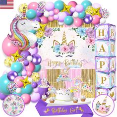 a unicorn birthday party with balloons and decorations