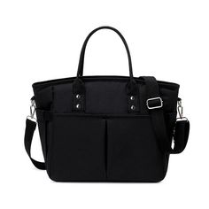 a black handbag with two compartments on the front and one compartment in the back