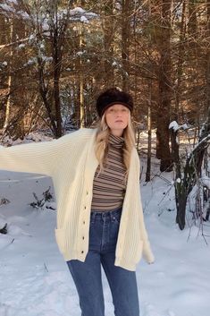 "Vintage oversized cream ribbed knit cardigan sweater! Chunky + thick acrylic knit - not scratchy! Shawl collar, deep v with buttons down the front and pockets! Unlined. Label: Sears Best Condition: In great vintage condition. Some minor pilling. Measurements: Seems to best fit a size large / oversized Bust: 44\" Sleeve: 27\" Overall Length: 29\" For reference, model is 5'9\" and measures 34/29/40 All measurements are taken flat and then doubled when appropriate. Please let us know if you have a Knit Chunky Sweater, Oversized Cardigan Sweater, Sweater Boho, Sweater Chunky, Oversized Sweater Cardigan, Cream Knit Sweater, Rib Knit Cardigan, Sweater Cream, Fisherman Sweater