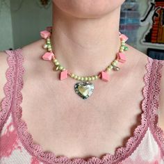 Add a touch of whimsy to your outfit with this upcycled pink beaded necklace featuring a baroque pearls and mother of pearl heart. This piece exudes BarbieCore cuteness, perfect for everyday wear or as a thoughtful gift for a neighbor. Stand out with this stylish and eco-friendly accessory that showcases individuality and sustainability. The jewelry is made of old materials and stainless fittings, which gives the necklace durability. ✤length : 14 inch + 1 extender chain (you can add or reduce th Pink Beaded Necklace, Eco Friendly Accessories, Fairy Jewelry, Pearl Heart, Cute Fairy, Pink Beaded, Neighbor Gifts, Baroque Pearls, Favorite Jewelry