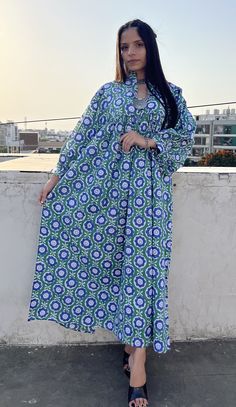 "DESCRIPTION gorgeous green blue flower fan printed maxi dress / Henley neckline boho maxi dress / 34th sleeve with buttons maxi dress Indian (Jaipur) Traditional Hand Block Printed Dresses for summer vacations, beaches wear, party wear, and more occasions to wear this dresses. PRODUCT DETAILS: 3/4th sleeve, Henley neck, Long dress FABRIC: soft and breathable cotton cambric WASH CARE:  wash in cold water, air dry in shade.. SLEEVE LENGTH - 18 inch Size chart is mentioned in images. Size chart is Green Floral Print Long Sleeve Maxi Dress, Long Sleeve Green Maxi Dress With Floral Print, Green Long Sleeve Maxi Dress With Floral Print, Flowy Floral Print Maxi Kaftan, Modest Green Flowy Maxi Dress, Blue Printed Long Maxi Dress, Green Boho Print Maxi Dress For Spring, Modest Green Floral Print Dress, Green Flowy Maxi Length Kaftan