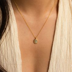 N A T U R A L ∙ L A B R A D O R I T E ∙ N E C K L A C E Our Natural Labradorite Necklace features a stunning Labradorite gemstone that shimmers with a captivating play of colors. The earthy tones and iridescent hues make it a perfect piece for adding a touch of natural elegance to any outfit. Wear this necklace to elevate your look with its unique and enchanting beauty ♡  * Material: High Quality Solid 925 Sterling Silver  * Finish: 18K Gold ∙ Sterling Silver  * Featuring ~16x5mm Natural Labrado Gemstone Pendant Necklace, Labradorite Necklace, Jade Necklace, Labradorite Necklaces, Domed Ring, Gemstone Necklace Pendant, Oval Pendant, Cable Chain, R A