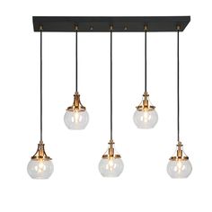 three lights that are hanging from a light fixture with glass globes on the bottom