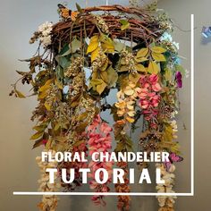 the floral chandelier is made with flowers and leaves