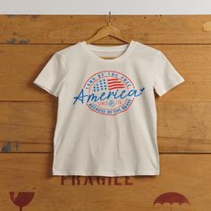 Make a statement at your next July 4th barbecue with this bold t-shirt that celebrates America’s freedom and honors the brave making it a must-have for any patriotic collection. .: The Comfort Colors 1717 tee is made with medium fabric (6.1 oz/yd² (206.8 g/m²)) consisting of high quality, 100% ring-spun US cotton for long-lasting comfort..: The relaxed fit keeps the wearer comfy in both casual and semi-formal settings while the crew neckline delivers that classic, neat style which makes it perfe Made In Usa Crew Neck T-shirt For Veterans Day, American Style Flag Print T-shirt For 4th Of July, American Style T-shirt Made In Usa For Summer, American Style T-shirt With American Flag For Independence Day, Americana Crew Neck T-shirt For 4th Of July, 4th Of July American Flag Print T-shirt, American Style T-shirt For Independence Day, Americana T-shirt With American Flag For Memorial Day, 4th Of July American Style Cotton T-shirt