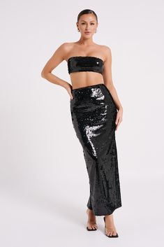 Take your twirl up a level.COSETTE is a full-length maxi skirt with a fitted waistline and sequined fabrication. Cut from lined polyester and closed via an invisible zipper, this skirt’s silhouette is smooth, sleek, and undeniably stylish. Its fresh versatility makes it the perfect partner for a variety of outfit styles. Black Sequin Crop Top, Sequin Maxi Skirt, Maxi Sequin Skirt, Outfit Styles, Sequin Crop Top, Adjustable Bra, Sequin Maxi, Perfect Partner, Oversized Blazer