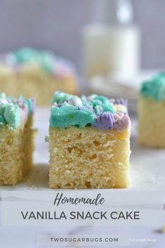 homemade vanilla snack cake with blue and green frosting