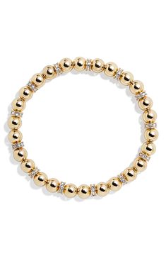 Pavé discs nestle between the gleaming beads, adding sparkle to the shine of this stretch bracelet. 6 3/4" inner circumference Goldtone plate/glass/cubic zirconia Imported Gold Beaded Bracelet, Cute Gold Beaded Stretch Bracelet, Gold Tarnish-resistant Beaded Bracelets As Gift, Adjustable Gold-plated Beaded Bracelets, Bracelet Sets, Trendy Gold Stretch Bracelet, Hypoallergenic, Classic Adjustable Gold-plated Beaded Bracelets, Gold Stretch Bracelet, Preppy Jewelry