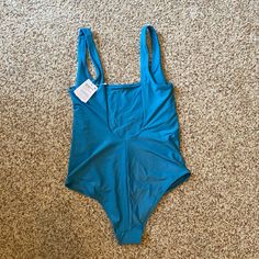 Lulu One-Piece Swimsuit * Size 10 (Fits True To Size) * Color “Marlin” (Rly Pretty Teal Blue) * New With Tags Perfect Condition, Never Worn, Still Has All Tags And The Sanitary Liner :) * Smoke Free Home * Bought Online A Few Months Ago And Just Didn’t Love The Style On My Body Super Flattering Design Though! Athleisure Bodysuit For Pool And Summer, Blue Scoop Neck Swimwear With Lined Body, Sporty Scoop Neck Swimwear Bodysuit, Summer Sports Scoop Neck Bodysuit, Sporty One-piece Swimwear For Yoga, Summer Sports Bodysuit With Scoop Neck, Sporty Scoop Neck Bodysuit For Swimming, Blue One-piece Swimwear For Workout, Athleisure Bodysuit For Poolside