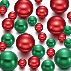 many red and green balls on a white surface